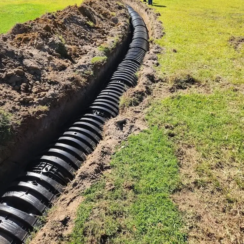 Flexible black underground stormwater pipe installation for drainage solutions.